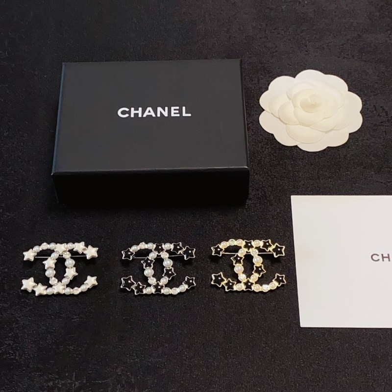 Ch**el brooches